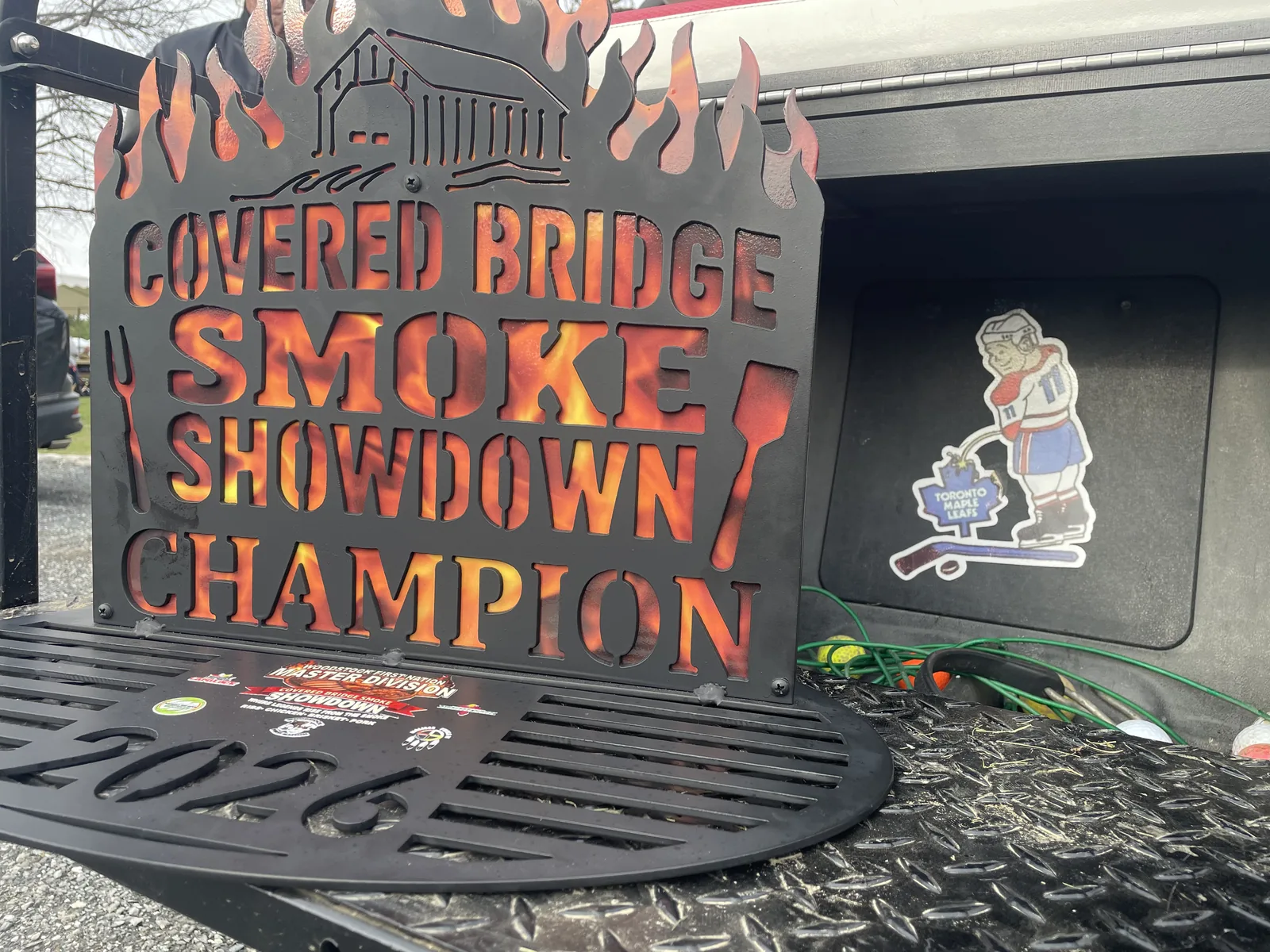Covered Bridge Smoke Showdown Champion trophy sign